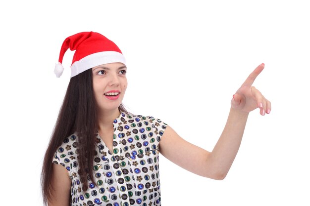 Pretty young girl in the Santa Claus cap