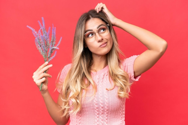 Pretty Young Uruguayan woman over isolated background