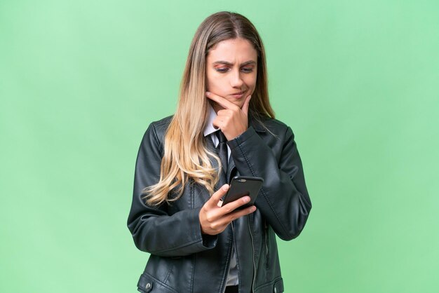 Pretty Young Uruguayan woman over isolated background