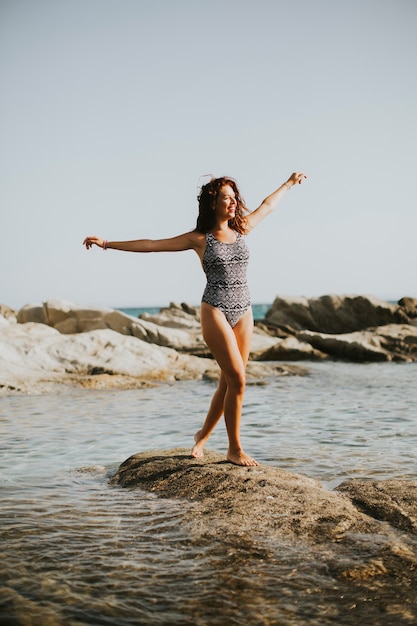 Pretty young woman on the beach