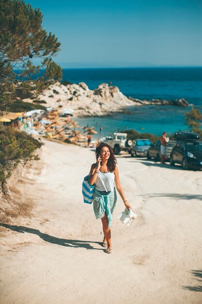 Pretty young woman on the beach