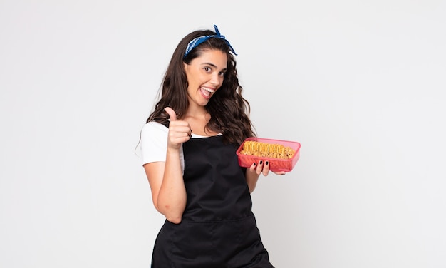 Pretty young woman holding a tupperware