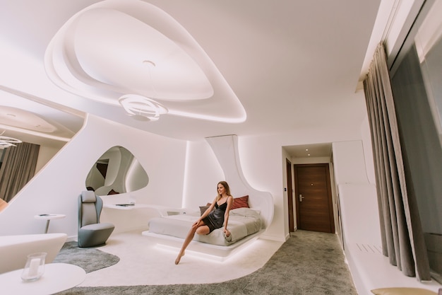 pretty young woman in the modern apartment