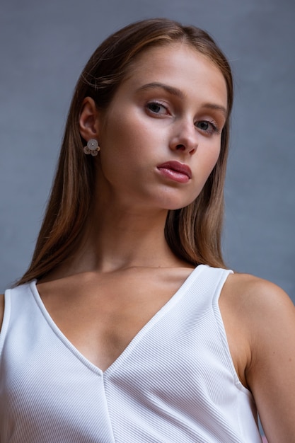 Pretty young woman posing in the studio