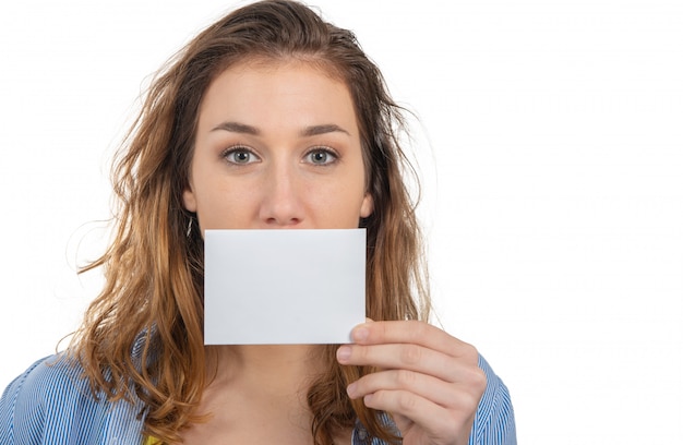 Pretty young woman showing small empty card