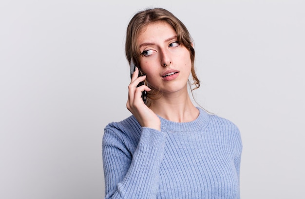 Pretty young woman using a smartphone