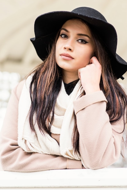 Pretty young woman with hat