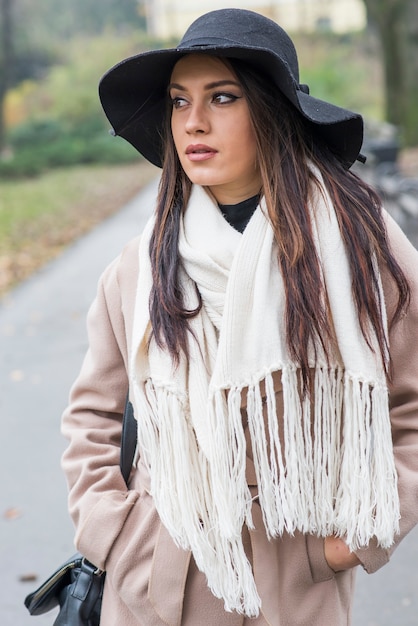 Pretty young woman with hat