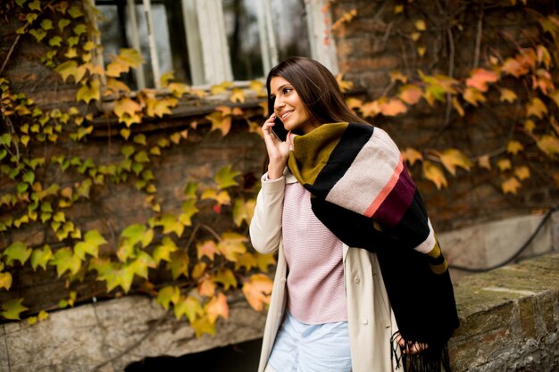 Pretty young woman with mobile phone