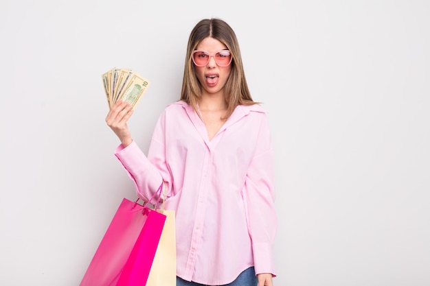 Pretty young woman with shopping bags