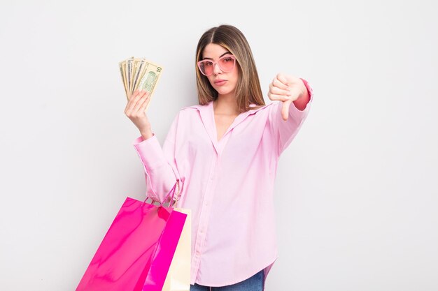 Pretty young woman with shopping bags