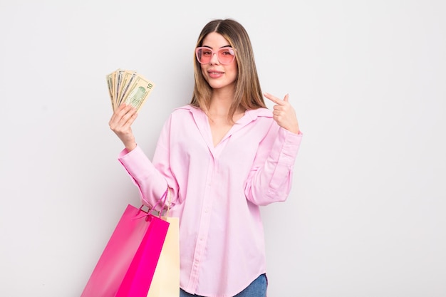 Pretty young woman with shopping bags