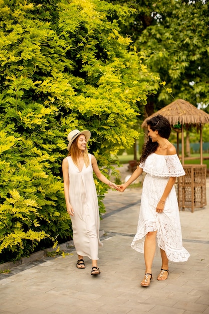 Pretty young women walking in the park