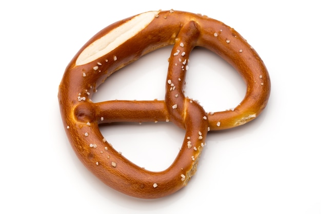 Pretzel isolated on white. Fresh fragrant brezel top view.