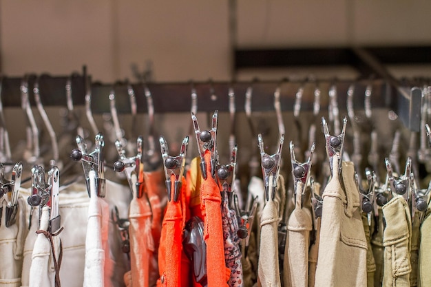 Preview jeans hanging on a hanger in the store