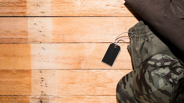 Price tag on male clothing over the wooden desk