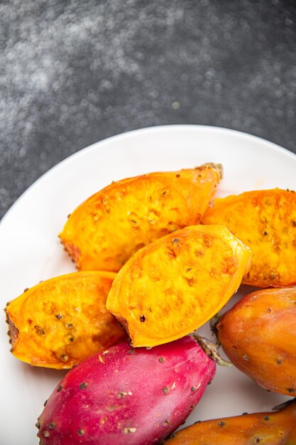 Prickly pear exotic fresh fruit figues de barbarie tasty appetizer meal food snack on the table