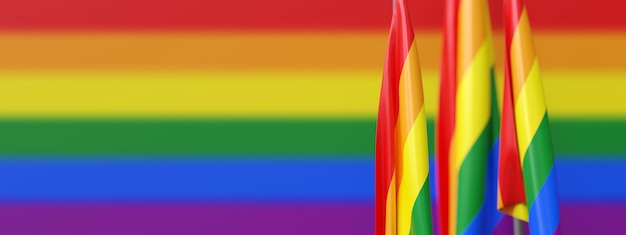 Pride flags on poles LGBT rainbow colors background banner