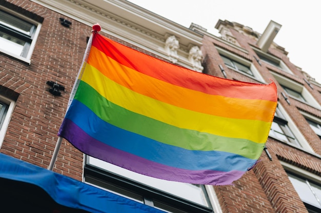 Photo pride month rainbow pride parade flag. equal rights lqbtq pride month. equality, same sex marriage