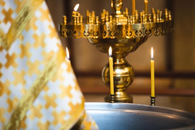 The priest illuminates the pectoral cross