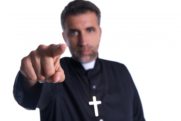 Priest pointing finger front as a blame