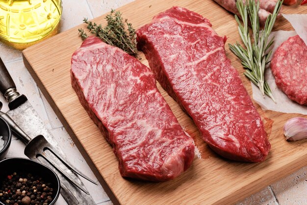 Prime marbled beef steaks Raw striploin steak