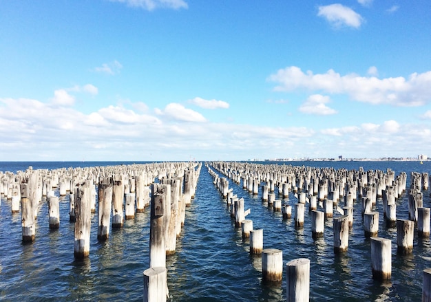 Princes Pier in Melbourne Australia the historical wooden pylons blue sky on the background