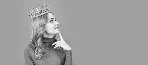 Princess woman with crown woman portrait isolated header banner
with copy space thoughtful blonde