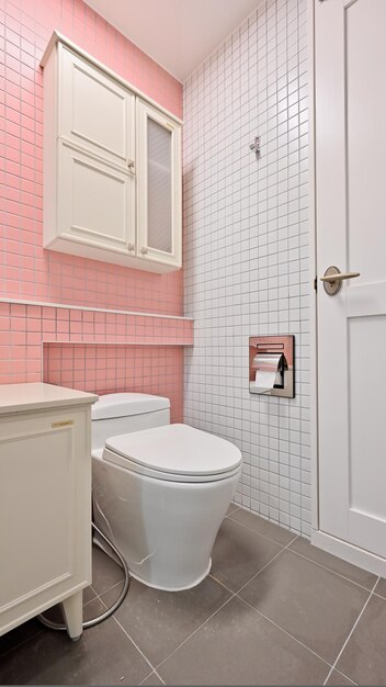 Princessstyle bathroom decorated with pink tiles