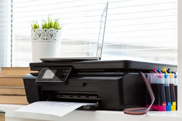 Photo printer and computer. office table