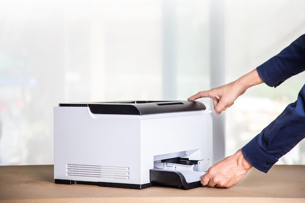 Printer copier scanner in office workplace photocopier machine\
for scanning document printing a sheet paper and xerox\
photocopy