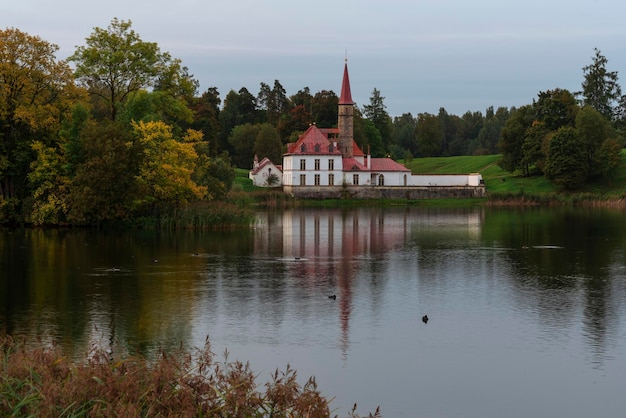 Priory Palace on the shore of the Black Lake on an autumn evening Gatchina Saint Petersburg Russia