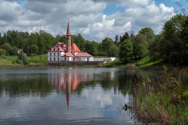 Priory Palace on the shore of the Black Lake on an summer sunny day Gatchina St Petersburg Russia