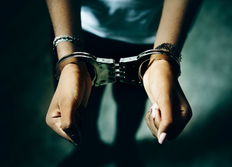 Photo prisoner with handcuffs on hands