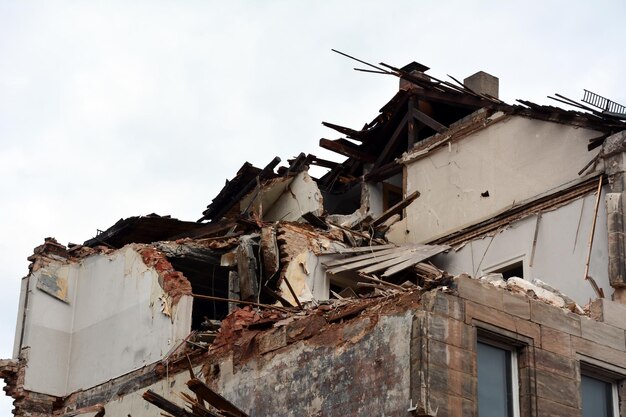 A private house destroyed by a missile strike with broken walls and ceiling