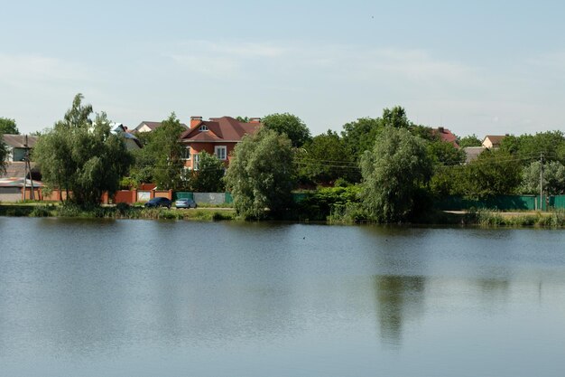 Private houses over a lake in the forest