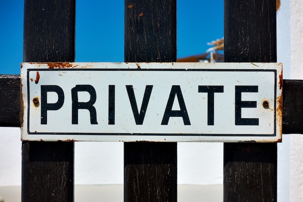 Private sign on a gate close-up