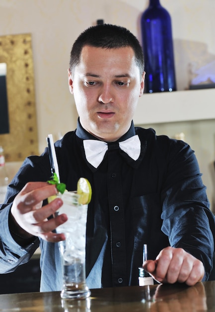 pro barman prepare coctail drink and representing nightlife and party event  concept