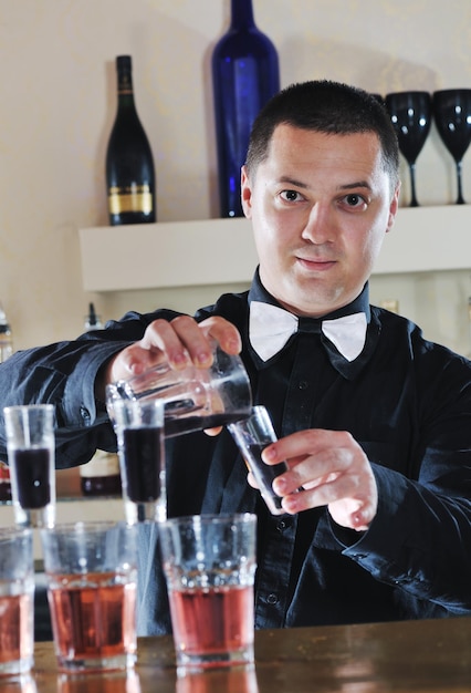 pro barman prepare coctail drink and representing nightlife and party event  concept