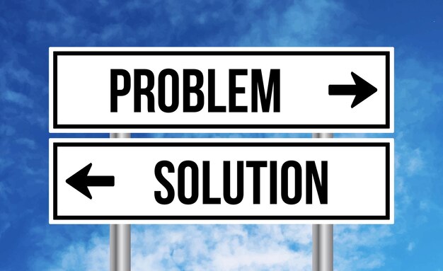 Photo problem or solution road sign on blue sky background