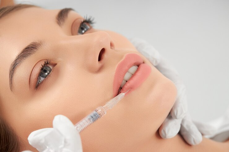 Photo procedure lip augmentation in professional salon