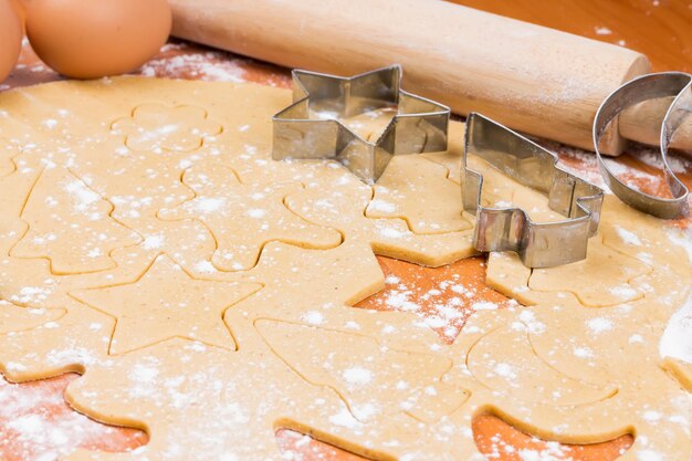 The process of baking homemade Christmas cookies Cutting cookie molds