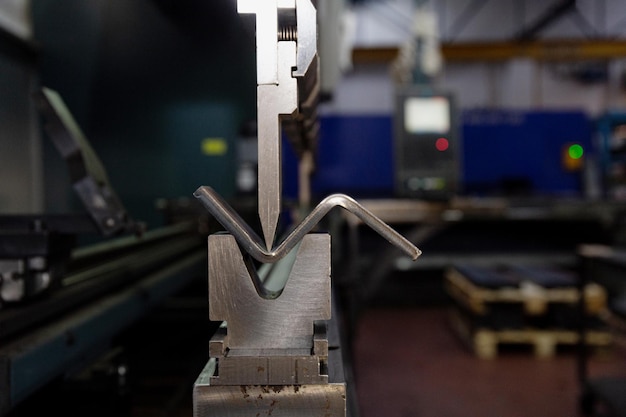 The process of bending galvanized sheet metal 2 millimeters thick on a special machine for bending