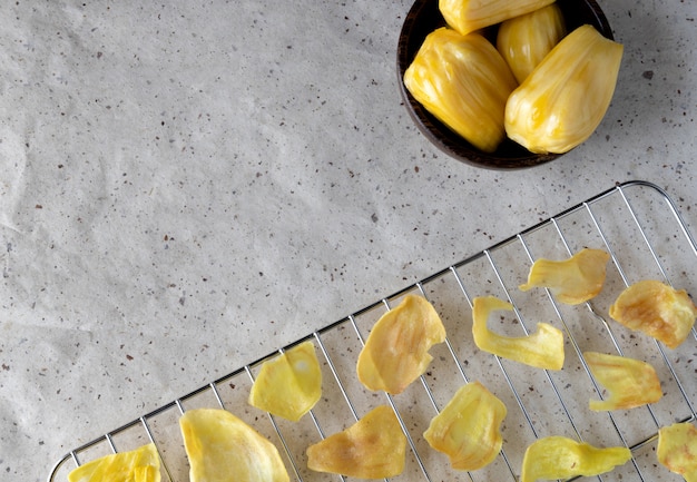 Process of cooking homemade jackfruit chips snacks.