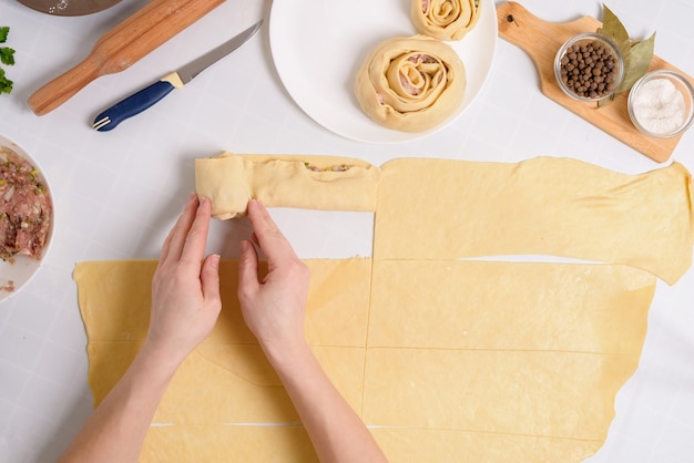 The process of cooking Uzbek manti at home, the ingredients are meat, vegetables, dough.