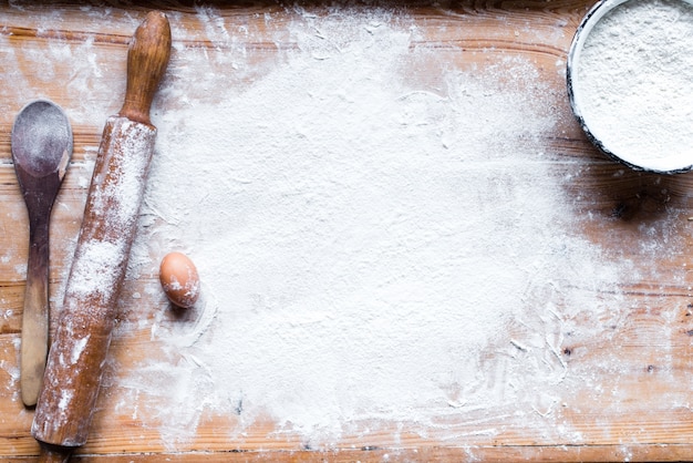 Photo the process of cooking, wooden background, top view