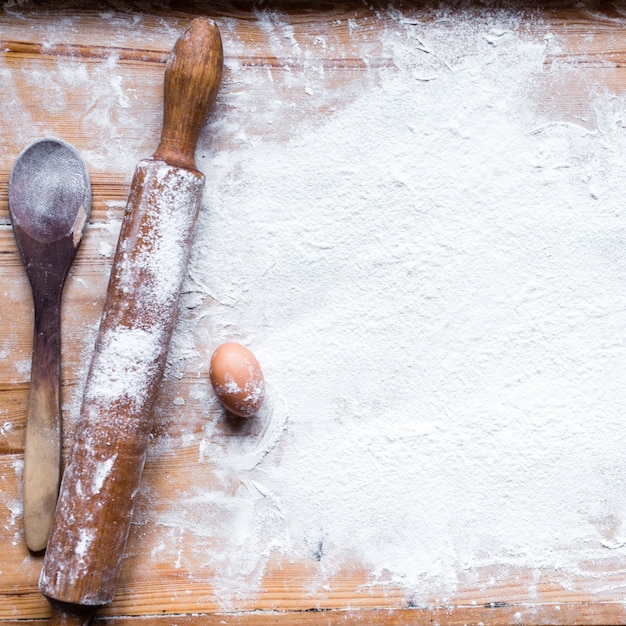 Photo the process of cooking, wooden background, top view