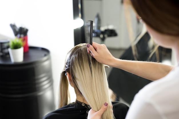 Photo process of dyeing hair at beauty salon