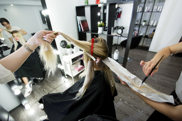 Process of dyeing hair at beauty salon