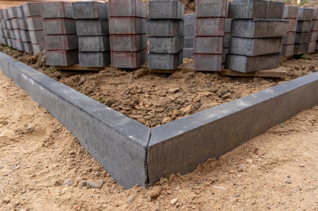 The process of laying pavers in the city on the street